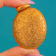 Large Antique 15ct Gold Engraved Oval Locket 12g, Front engraving on blue background