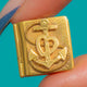 Victorian 15ct Gold book locket, close-up of the raised cross, heart, anchor and rope