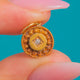 Etruscan Revival Diamond charm, close-up of decorated Gold front