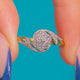 Art Deco Diamond flower cluster ring with swirling shoulders