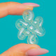 Pale translucent Jadeite knot carving with interlaced loops