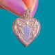 Dainty Art Nouveau Silver Repousse Heart Charm, Bow Motif
